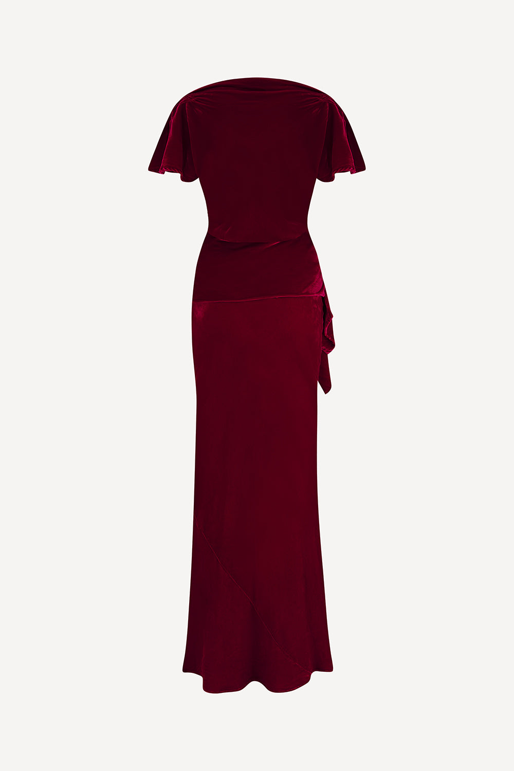 Back of red velvet dress on a white background