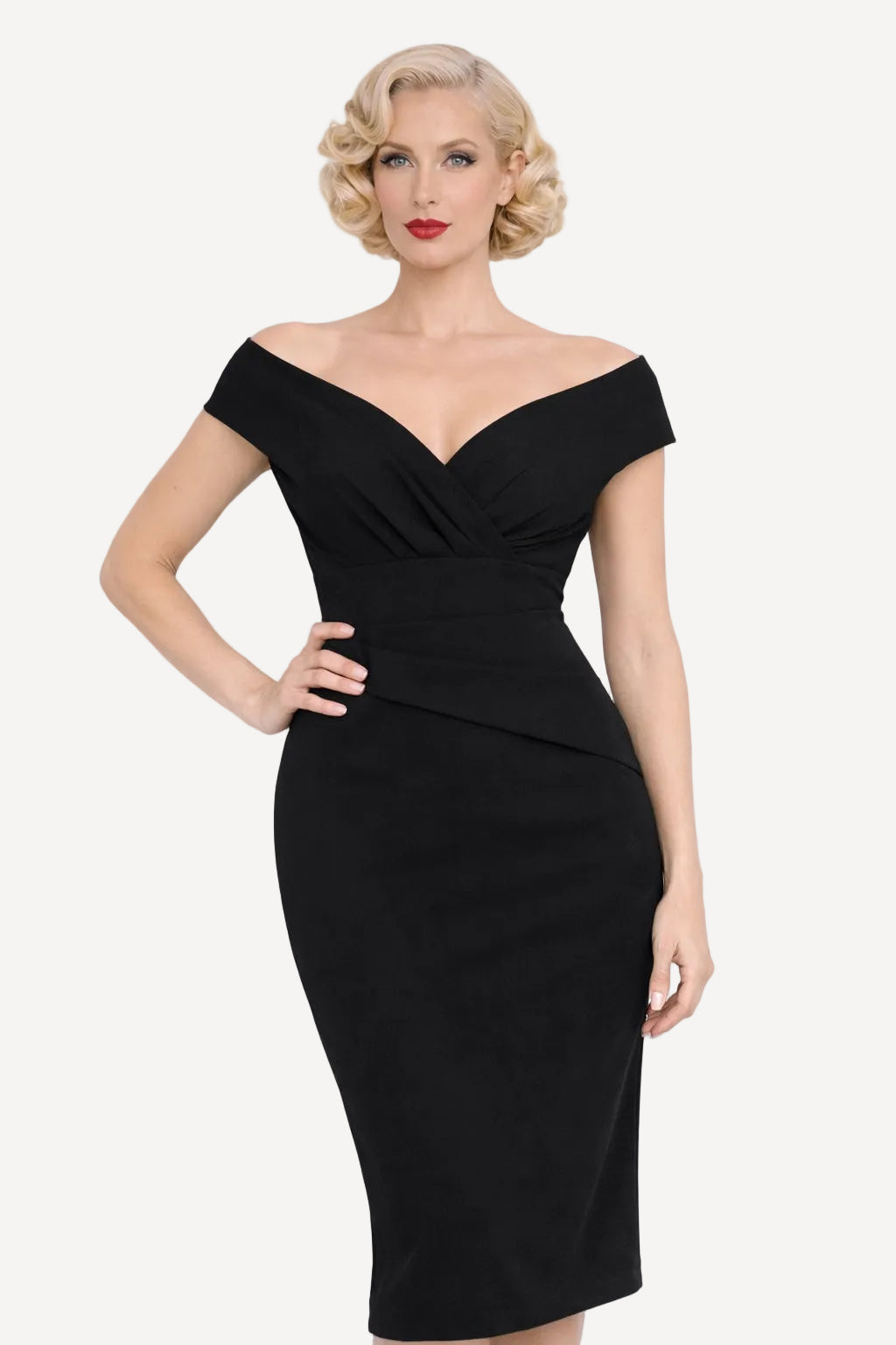 Woman wearing a black off-shoulder 111950s style wiggle dress against a white background
