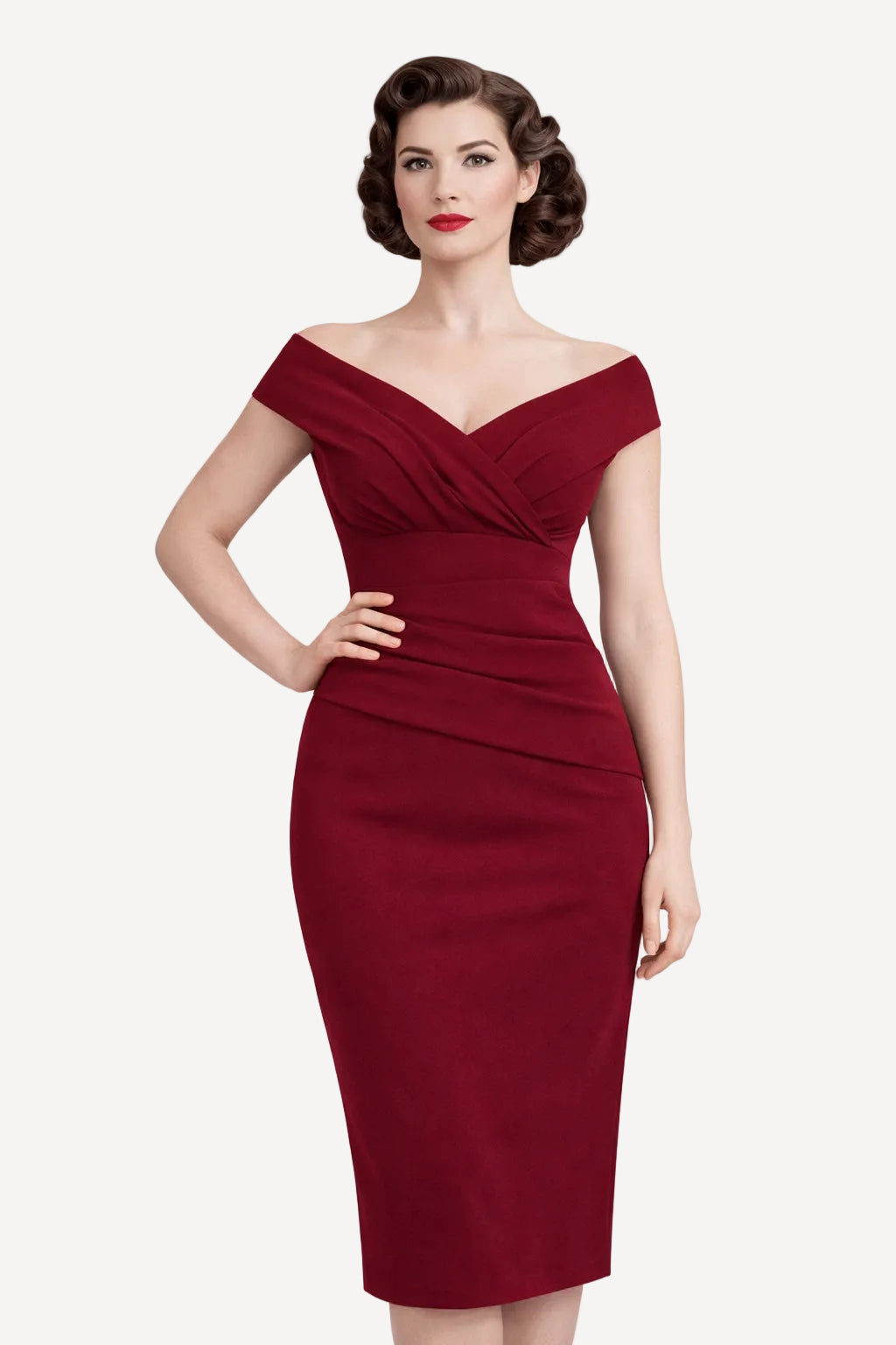 Woman wearing a burgandy wiggle dress against a white background